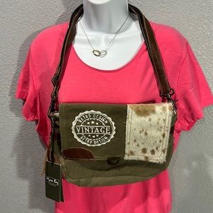 NWT myra canvas and cowhide Messanger style bag!